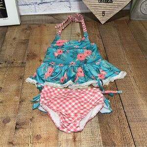 Oopsie daisy two
Piece swimsuit ruffle size 4